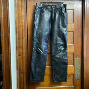 Lined Leather straight legged pants with pockets.
